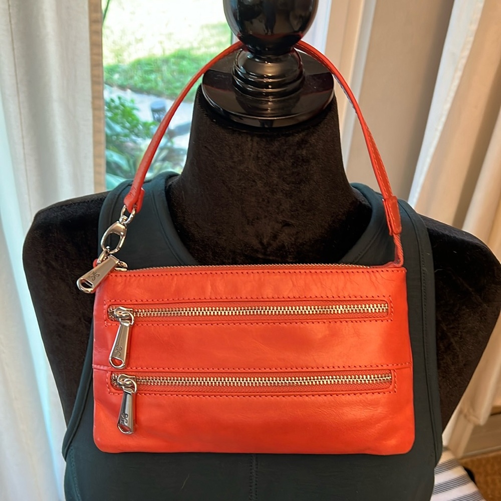 Hobo coral pink leather crossbody / shoulder bag with chrome zippers